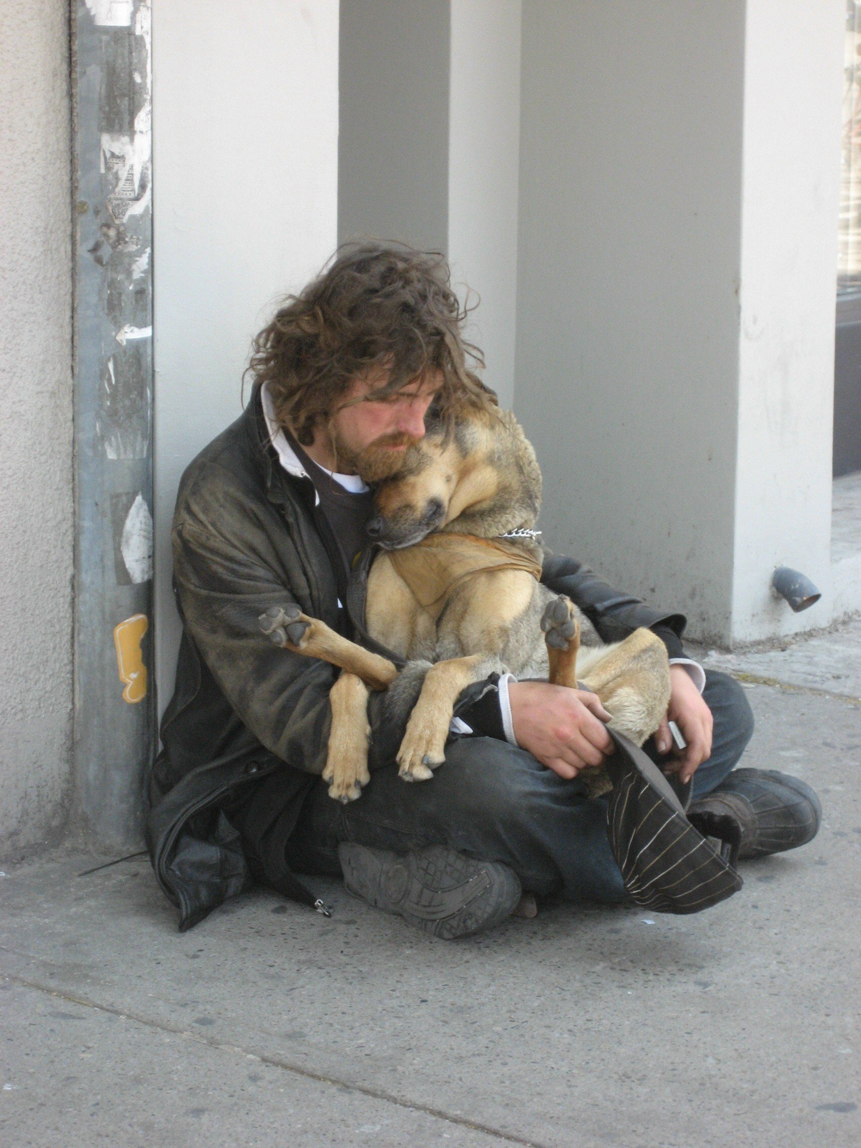 http://rebirth22.files.wordpress.com/2007/06/homeless-cuddling-dog-by-kirsten-bole-100-dpi.jpg